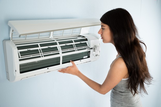 stock-photo-50168362-cleaning-air-conditioner